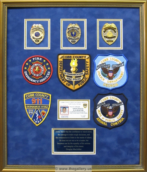 Cobb County Police Department retirement shadow box with police badges, patches, ID cards and lapel pins.






The Gallery at Brookwood
www.thegallery.us
770-941-3394
Your Custom Framing Expert
Picture Framing Examples
Custom Framing Examples
Shadowbox Examples
IMG_2417