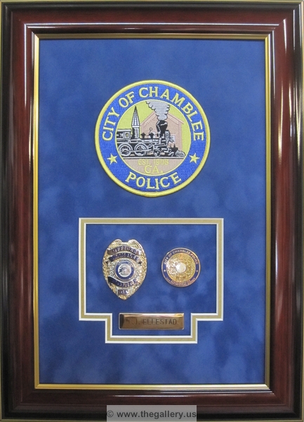  Police Department retirement shadow box with police badges, patches, ID cards and lapel pins. 






The Gallery at Brookwood
www.thegallery.us
770-941-3394
Your Custom Framing Expert
Picture Framing Examples
Custom Framing Examples
Shadowbox Examples
IMG_2709