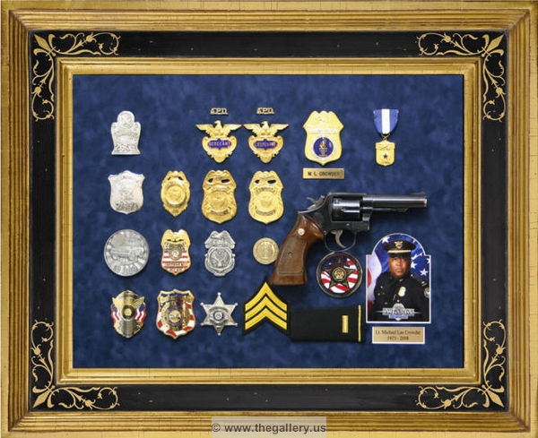 Police retirement shadow box with gun, badges, patchs, photo, lapel pins and awards.






The Gallery at Brookwood
www.thegallery.us
770-941-3394
Your Custom Framing Expert
Picture Framing Examples
Custom Framing Examples
Shadowbox Examples
atlanta_police_framed_with_gun_shadow_box