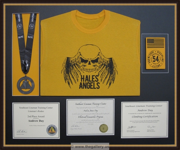 Hales Angels Lineman shadow box with t shirt with certificates






The Gallery at Brookwood
www.thegallery.us
770-941-3394
Your Custom Framing Expert
Picture Framing Examples
Custom Framing Examples
Shadowbox Examples
hales-angels-lineman-shadow-box