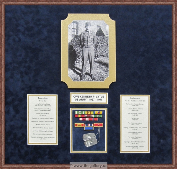 Military shadow box with pins, patches, and certificate.






The Gallery at Brookwood
www.thegallery.us
770-941-3394
Your Custom Framing Expert
Picture Framing Examples
Custom Framing Examples
Shadowbox Examples
military-shadowbox