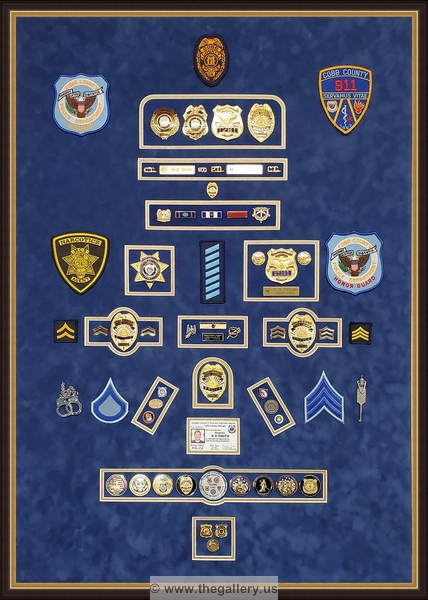  Police Department retirement shadowbox with police badges, patches, ID cards and lapel pins.






The Gallery at Brookwood
www.thegallery.us
770-941-3394
Your Custom Framing Expert
Picture Framing Examples
Custom Framing Examples
Shadowbox Examples
texture2_22435503_54