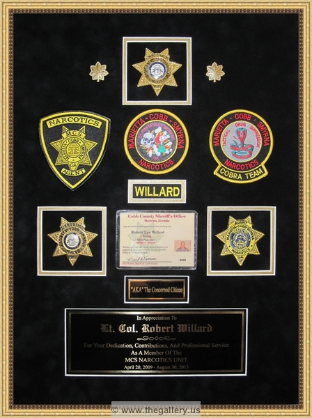 Police Department retirement shadow box with police badges, patches, ID cards and lapel pins.


military shadow box layouts, military shadow box plans, how to build a military shadow box display case, military shadow box near me, military shadow box ideas, military shadow box display case, military shadow box with uniform, military shadow box with flag, 



The Gallery at Brookwood
www.thegallery.us
770-941-3394
Your Custom Framing Expert
Picture Framing Examples
Custom Framing Examples
Shadowbox Examples
texture5_13596877_26