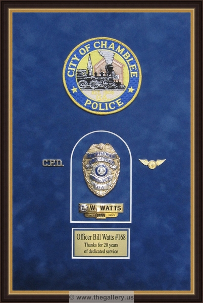  Police Department retirement shadow box with police badges, patches, ID cards and lapel pins.






The Gallery at Brookwood
www.thegallery.us
770-941-3394
Your Custom Framing Expert
Picture Framing Examples
Custom Framing Examples
Shadowbox Examples
texture6_596574_5