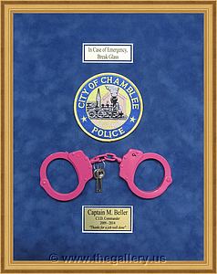  Police Department retirement shadow box with handcuffs, patches, ID cards and lapel pins.

The Gallery at Brookwood
www.thegallery.us
770-941-3394
Your Custom Framing Expert
Picture Framing Examples
Custom Framing Examples
Shadowbox Examples