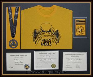 Hales Angels Lineman shadow box with t shirt with certificates

The Gallery at Brookwood
www.thegallery.us
770-941-3394
Your Custom Framing Expert
Picture Framing Examples
Custom Framing Examples
Shadowbox Examples