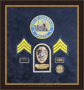 Police badge and patches shadowbox 

The Gallery at Brookwood
www.thegallery.us
770-941-3394
Your Custom Framing Expert
Picture Framing Examples
Custom Framing Examples
Shadowbox Examples