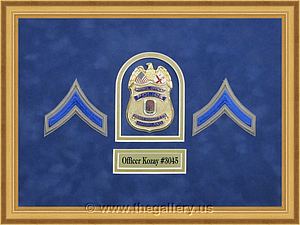  Police Department retirement shadow box with police badges, patches

The Gallery at Brookwood
www.thegallery.us
770-941-3394
Your Custom Framing Expert
Picture Framing Examples
Custom Framing Examples
Shadowbox Examples