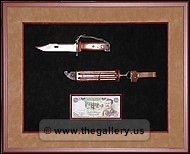 Shadowbox with Iraq knife and money.
downtown_atlanta_picture_framing.jpg