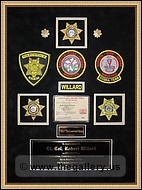Police Department retirement shadow box with police badges, patches, ID cards and lapel pins.
norcross_mirror_framer.jpg