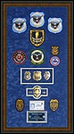 Police Department retirement shadow box with police badges, patches, ID cards and lapel pins.
Austell_frames_and_moulding.jpg