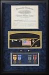 Honorable Discharge Certificate with hat and metals.
Dallas_Picture_Hanger.jpg