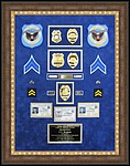 Police Department retirement shadow box
 with police badges, patches, ID cards and lapel pins.
alpharetta_mirror_framer.jpg