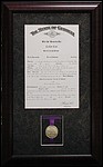 Framed certificate with medal.
austell_mirror_framer.jpg