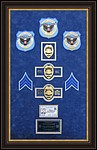 Police Department retirement shadow box with police badges, patches, ID cards and lapel pins.
houseofframes.jpg