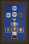Cobb County Police Department retirement shadow box with police badges, patches, ID cards and lapel pins.
office_of_state_administrative_hearings.jpg