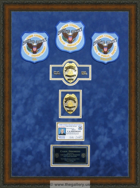 Police Department retirement shadow box with police badges, patches, ID cards and lapel pins.


police shadow box ideas



The Gallery at Brookwood
www.thegallery.us
770-941-3394
Your Custom Framing Expert
Picture Framing Examples
Custom Framing Examples
Shadowbox Examples
custom_made_Police_Department_retirement_shadow_box_with_badges