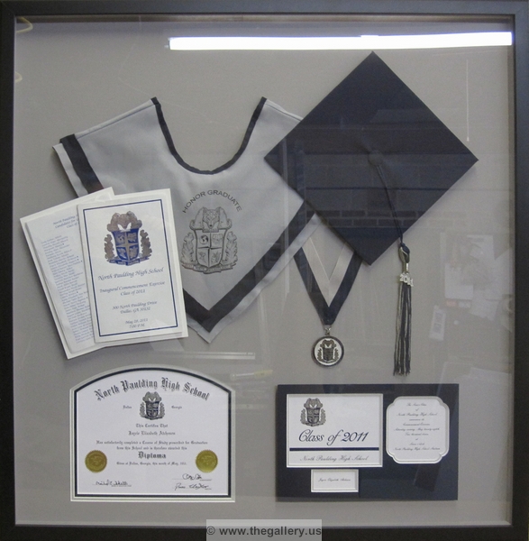Paulding County Georgia High School Graduation Shadow box with hat, tassel, high school diploma and graduation announcement.






The Gallery at Brookwood
www.thegallery.us
770-941-3394
Your Custom Framing Expert
Picture Framing Examples
Custom Framing Examples
Shadowbox Examples
paulding_county_grad