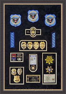 Police Department retirement shadow box examples

The Gallery at Brookwood
www.thegallery.us
770-941-3394
Your Custom Framing Expert
Picture Framing Examples
Custom Framing Examples
Shadowbox Examples