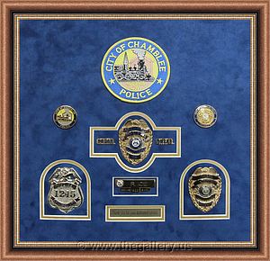 Chamblee Police Department Shadowbox Retirement Gift

The Gallery at Brookwood
www.thegallery.us
770-941-3394
Your Custom Framing Expert
Picture Framing Examples
Custom Framing Examples
Shadowbox Examples