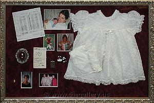 Christening gown shadow box

The Gallery at Brookwood
www.thegallery.us
770-941-3394
Your Custom Framing Expert
Picture Framing Examples
Custom Framing Examples
Shadowbox Examples