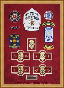 Cobb County Fire Department retirement shadow box with badges, patches and lapel pins.

The Gallery at Brookwood
www.thegallery.us
770-941-3394
Your Custom Framing Expert
Picture Framing Examples
Custom Framing Examples
Shadowbox Examples