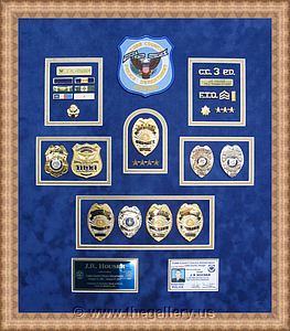 Police Department retirement shadow box examples

The Gallery at Brookwood
www.thegallery.us
770-941-3394
Your Custom Framing Expert
Picture Framing Examples
Custom Framing Examples
Shadowbox Examples