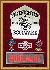 Cobb County Fire Department shadow box with badges with patches for Stacy Boulware's family.

The Gallery at Brookwood
www.thegallery.us
770-941-3394
Your Custom Framing Expert
Picture Framing Examples
Custom Framing Examples
Shadowbox Examples