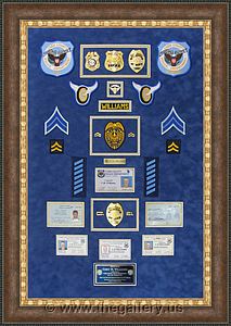 Cobb County Police Department retirement shadow box with police badges, patches, ID cards and lapel pins.

The Gallery at Brookwood
www.thegallery.us
770-941-3394
Your Custom Framing Expert
Picture Framing Examples
Custom Framing Examples
Shadowbox Examples