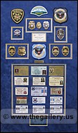 Cobb County Police Department retirement shadow box with police badges, patches, ID cards and lapel pins.
Alpharetta_Picture_Hanger.jpg