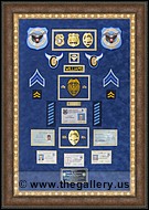 Cobb County Police Department retirement shadow box with police badges, patches, ID cards and lapel pins.
Norcross_Frame_Shop.jpg