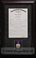 Framed certificate with medal.
austell_mirror_framer.jpg