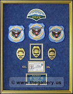 Cobb County Police Department retirement shadow
 box with police badges, patches, ID cards and lapel pins.
decatur_mirror_framer.jpg