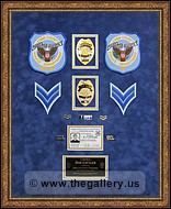Cobb County Police Department retirement shadow box with police badges, patches, ID cards and lapel pins.
woodstock-mirror-framer.jpg